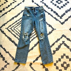 Pacsun darker wash jean with rips. size 25